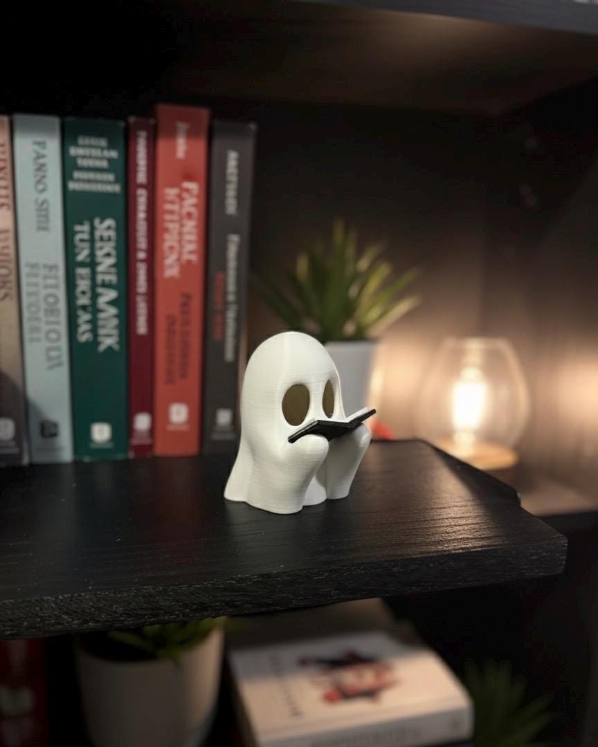 Ghost reading tea light cover